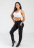 Full View Woman Wearing White Crop Bra and Black Boyfriend Joggers Front 3/4 View