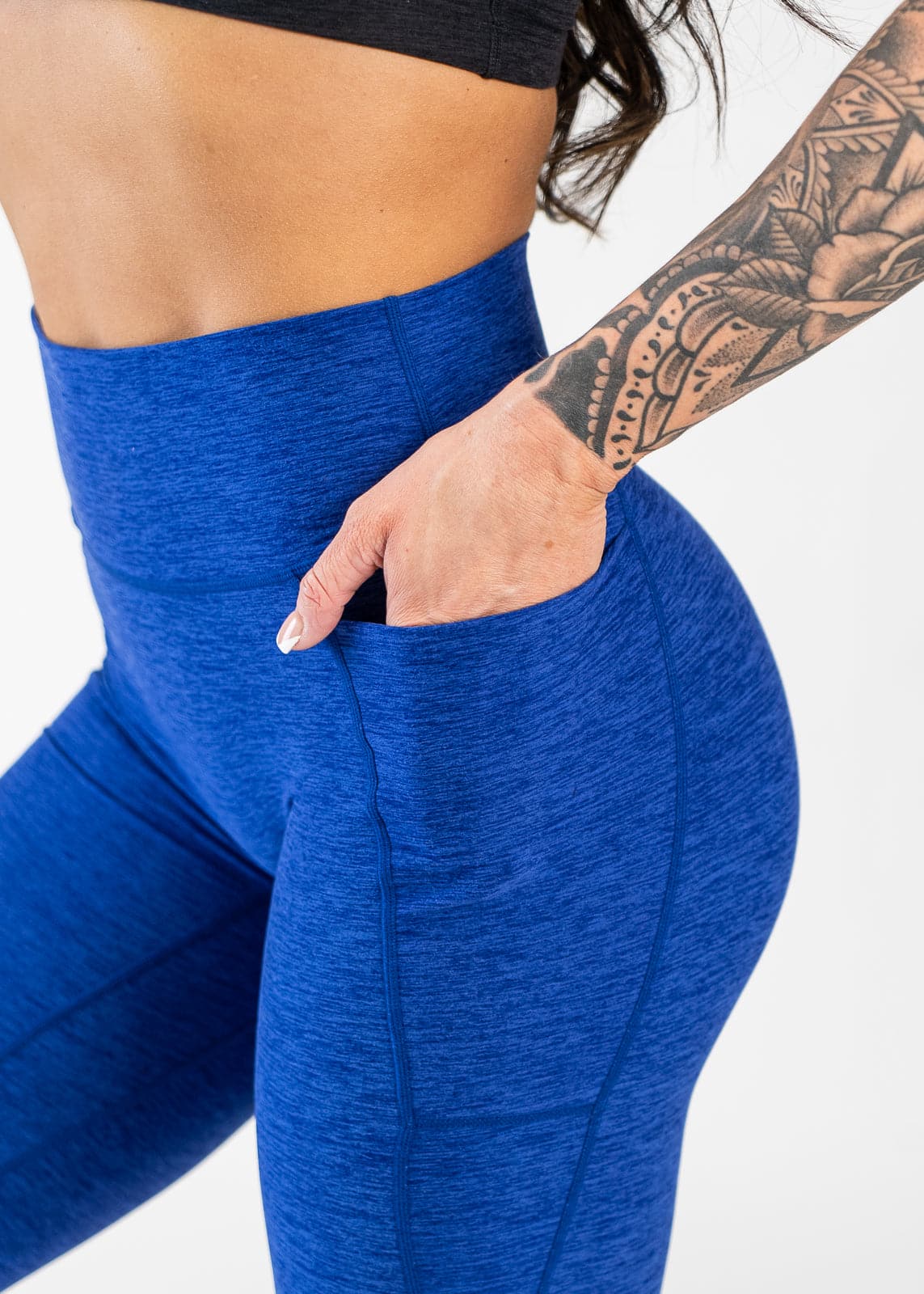 Close Up Side View Hand in Pocket Wearing Dream Leggings With Pockets | Blue Razz