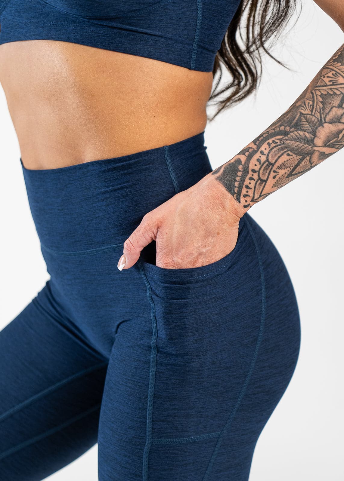 Close Up Side View Hand in Pocket Wearing Dream Leggings With Pockets | Deep Blue