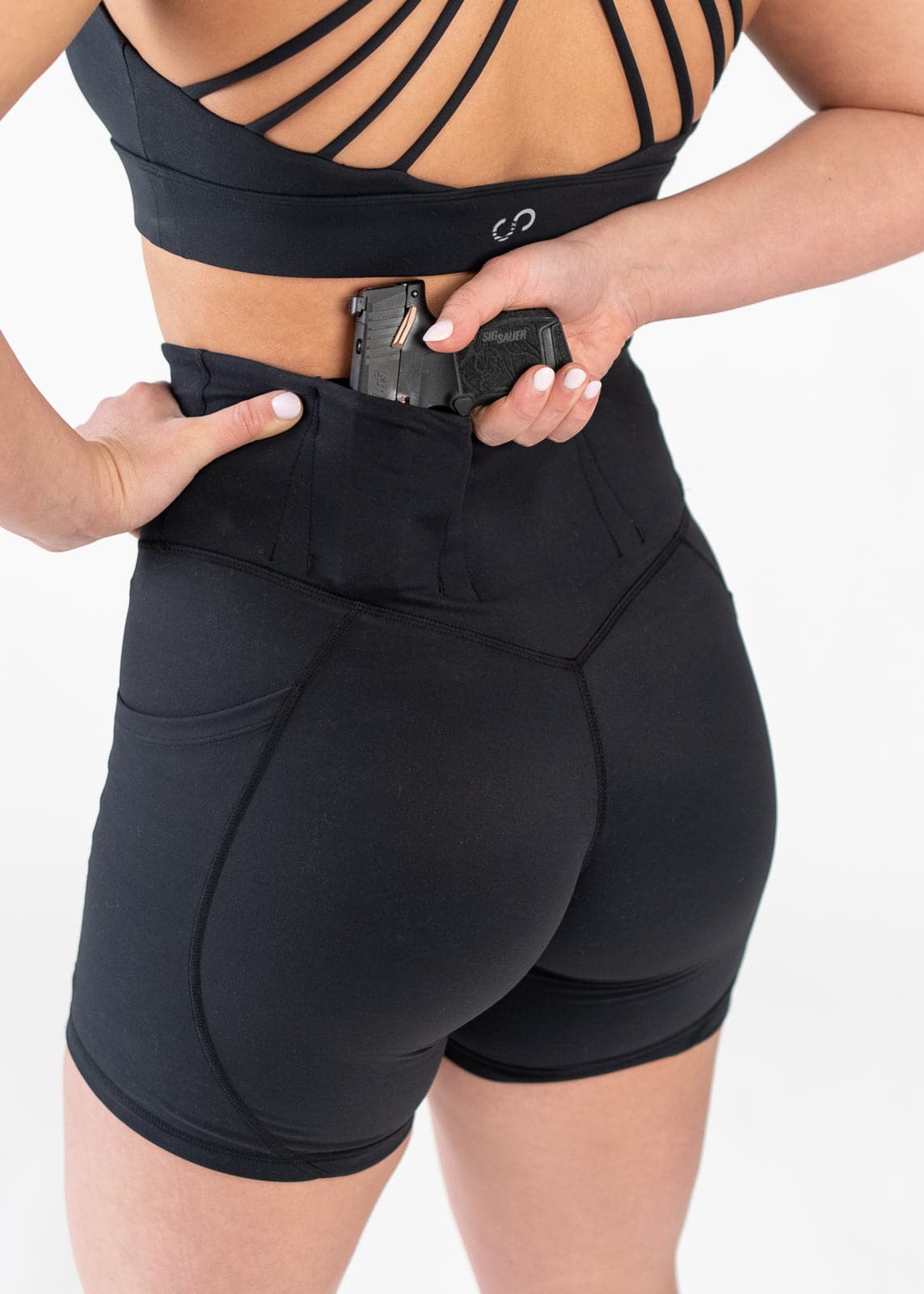 Close Up Back View Reaching for Concealed Carry - Concealed Carry Shorts With Pockets | Black