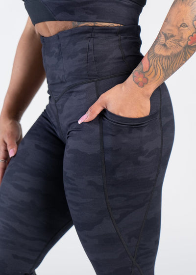 Concealed Carry Leggings With Pockets Side View with Hand in Pocket | Black Camo