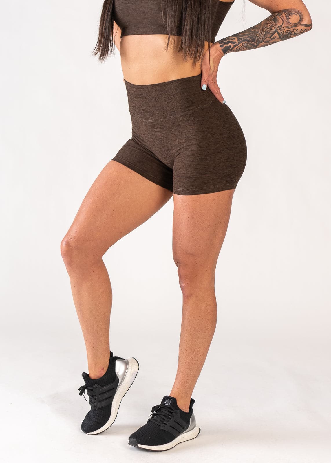 Chest Down 3/4 Side View One Leg Up Wearing Dream 4" Shorts | Cocoa
