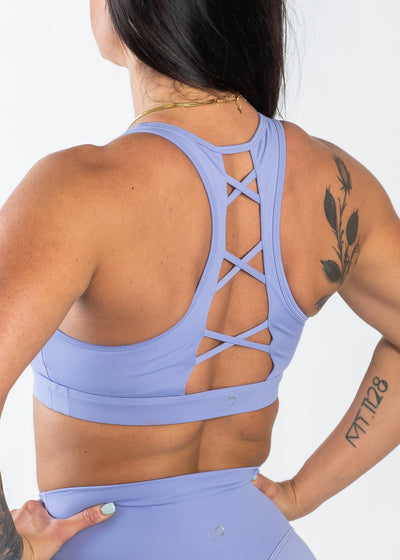 Chin to Waist with Hands on Hips Wearing Empowered Laced Back Sports Bra | Periwinkle