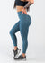 Chest Down Side View One Leg Up Wearing Empowered Leggings With Pockets | Teal