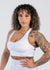 Waist Up Front View With One Hand on Hip Wearing Empowered Double Brushed Bra | Snow Camo
