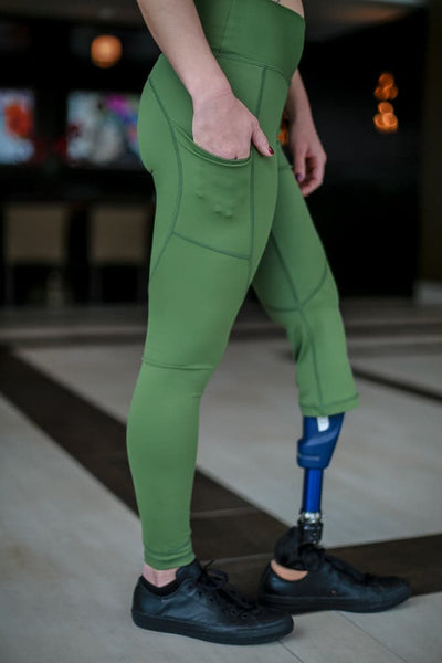 Left side view of right leg below the knee amputee leggings with pockets-Military Green.