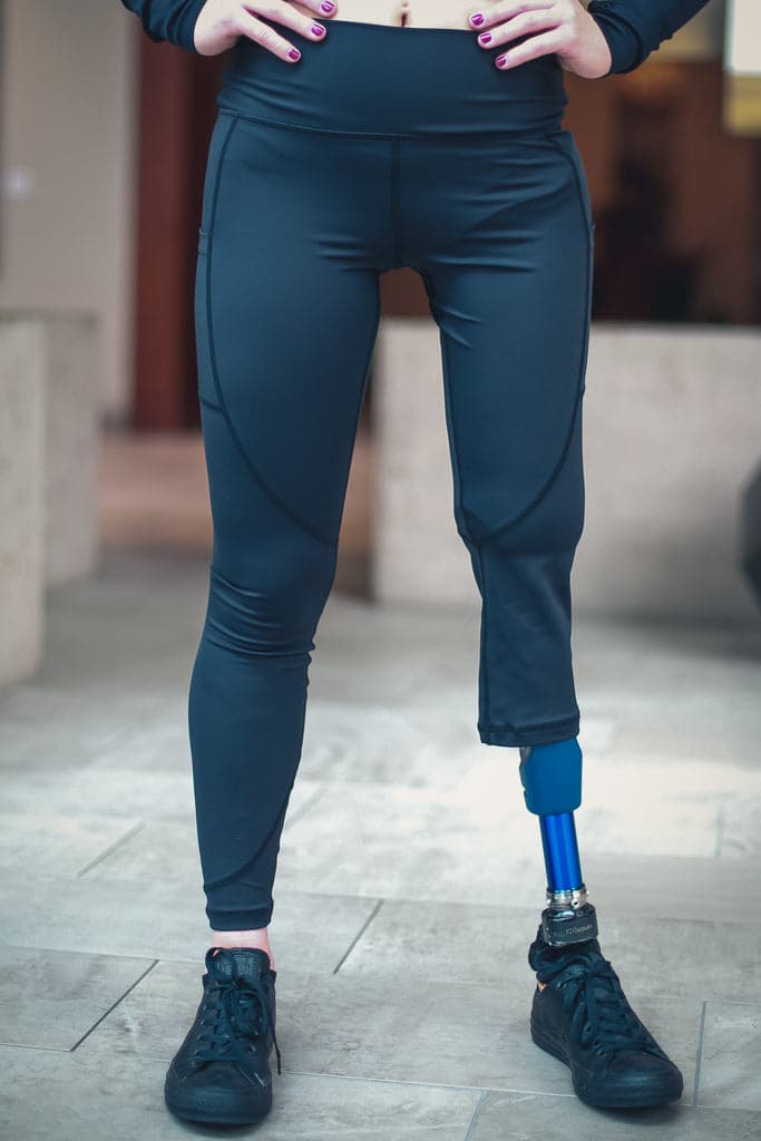 Front view of right leg below the knee amputee leggings with pockets-Black.