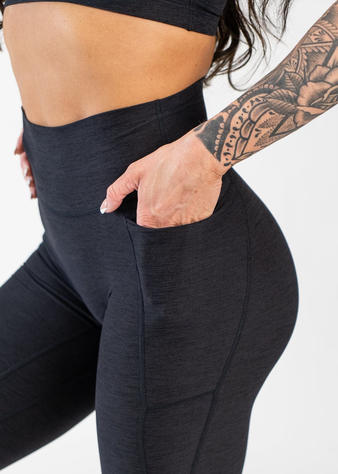 Close Up Side View Hand in Pocket Wearing Dream Leggings With Pockets | Black