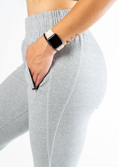 Boyfriend Joggers in Heather Grey Side View Hips Close Up Hands in Pocket