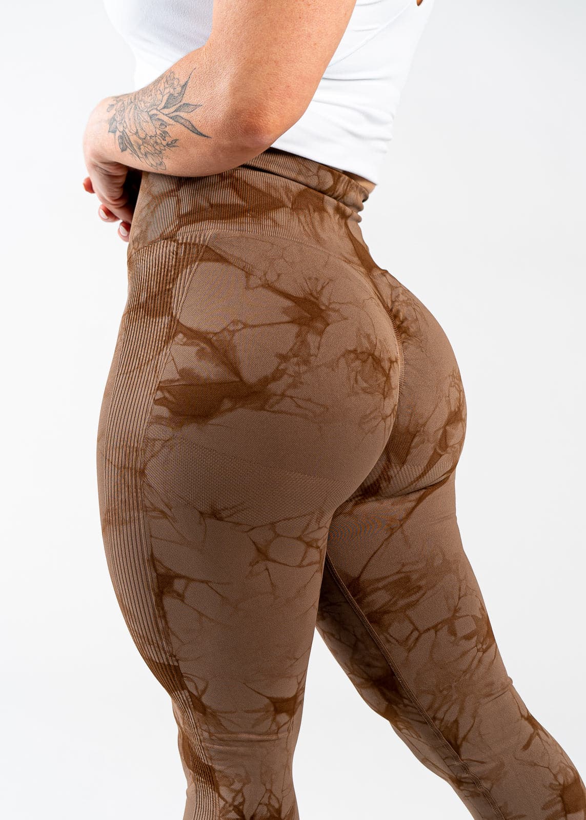 Close Up 3/4 Back View of Glutes in Contour Seamless Leggings - Brown Marble