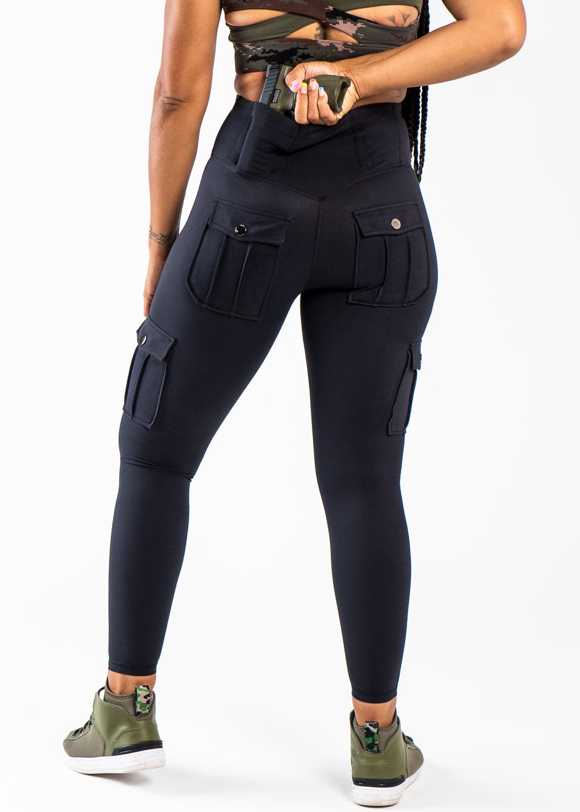 Shoulders Down 3/4 Back View - Concealed Carry Leggings With Tactical Pockets Reaching for Concealed Carry | Black
