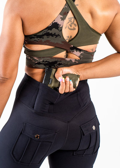 Close Up 3/4 Back View Reaching for Concealed Carry - Concealed Carry Leggings With Tactical Pockets | Black
