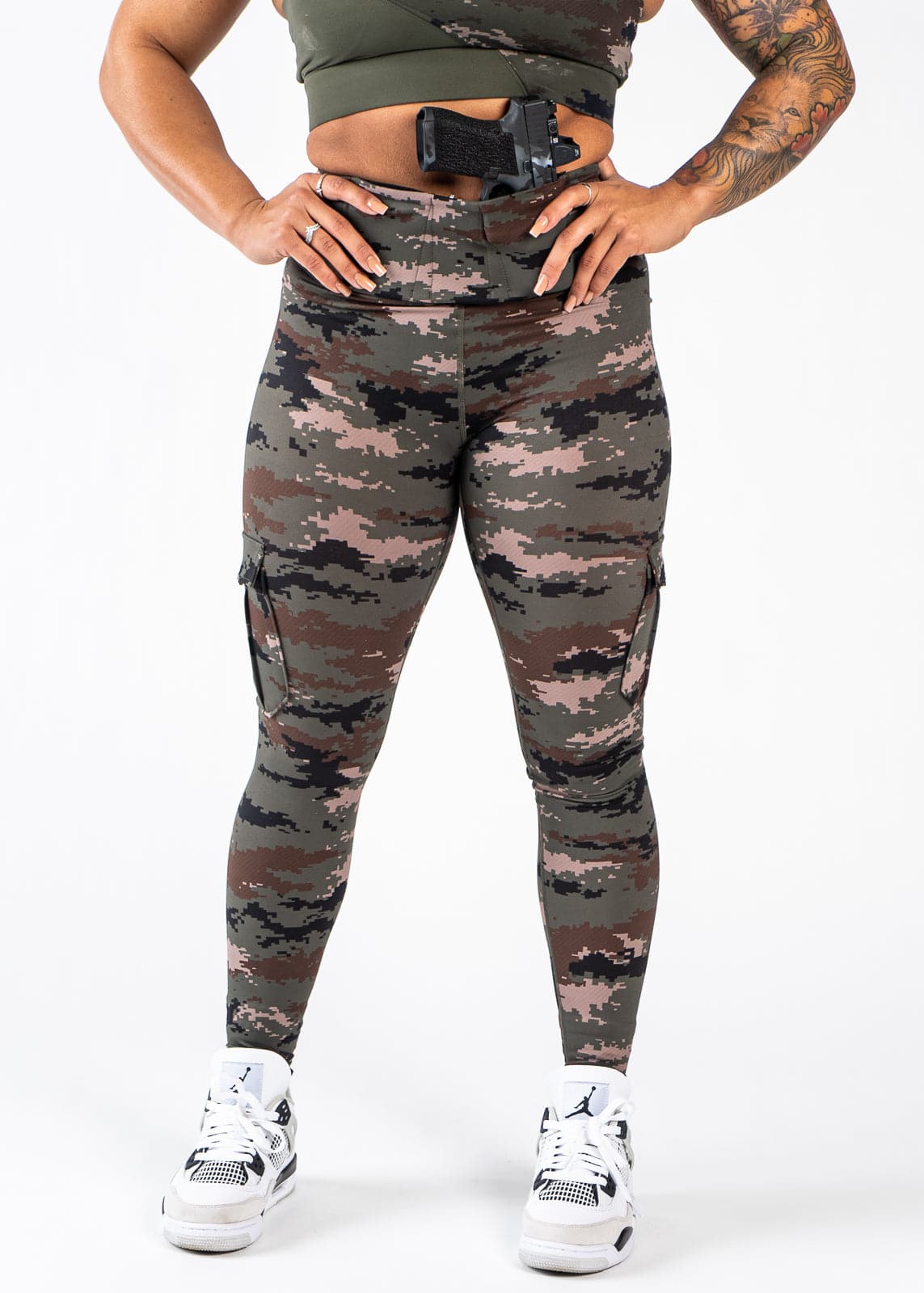 Concealed Carry Leggings Shoulders Down Front View with Hands on Sides | Green Camo