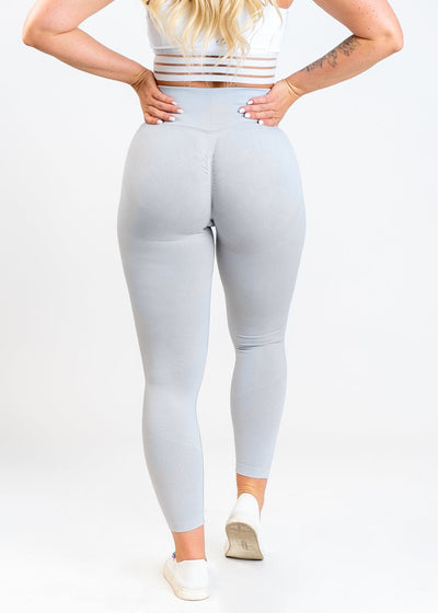 Chest Down Back View with Hands on Back in Contour Seamless Leggings - Ice