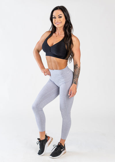 Full Body 3/4 Front Facing View With One Hand on Hip Wearing Dream Leggings With Pockets | Mist