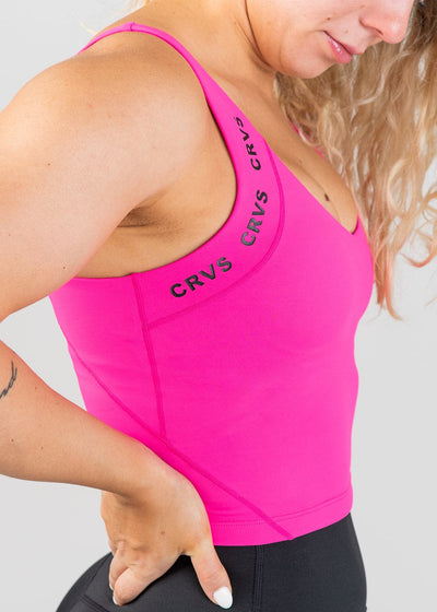 Waist Up Side View Wearing CRVS Crop Bra | Hot Pink