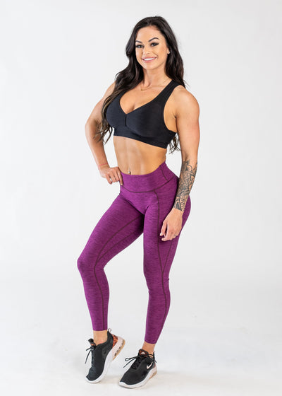 Full Body 3/4 Front Facing View With One Hand on Hip Wearing Dream Leggings With Pockets | Raspberry