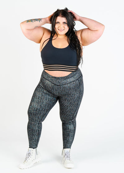 Full Body Front View Hands on Head Plus Sized Model Wearing Empowered Leggings With Pockets | Black/Silver