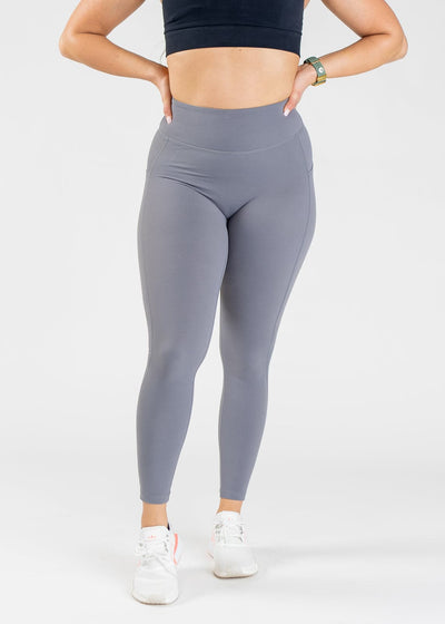 Chest Down Front View With Hands On Hips Wearing Empowered Double Brushed Leggings - Slate