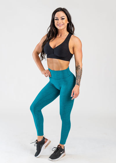 Full Body 3/4 Front Facing View With One Hand on Hip Wearing Dream Leggings | Teal