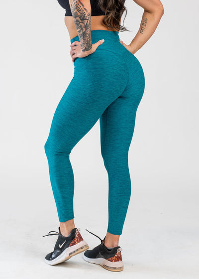 Chest Down 3/4 Back View With Hands on Hips Wearing Dream Leggings | Teal